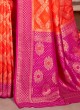 Attractive Orange And Rani Color Banarasi Silk Saree